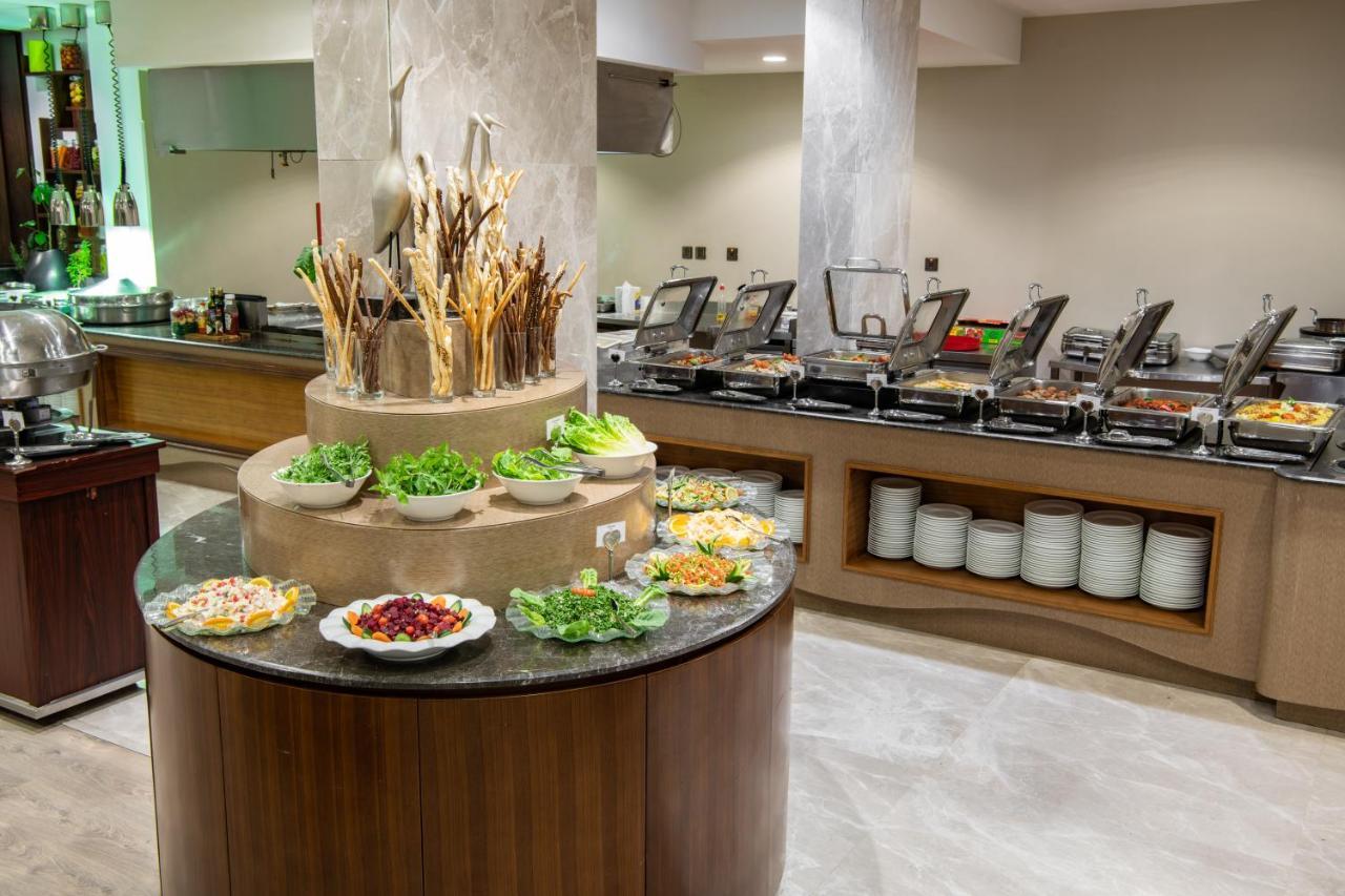 Radisson Blu Hotel, Buraidah Extérieur photo